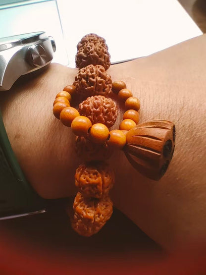 Rudraksha Bracelet with Lotus Charm – 10mm Spiritual Growth - Lumala | Natural Wood Bracelets for Mindful Living